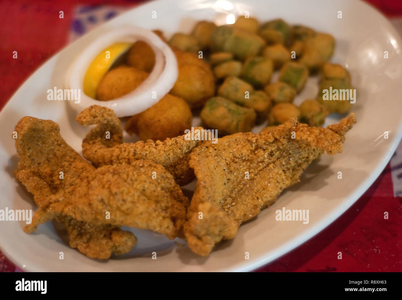 A plate of fried catfish and fried okra is served at Taylor Grocery in  Taylor, Mississippi. The restaurant is famous for its catfsh Stock Photo -  Alamy