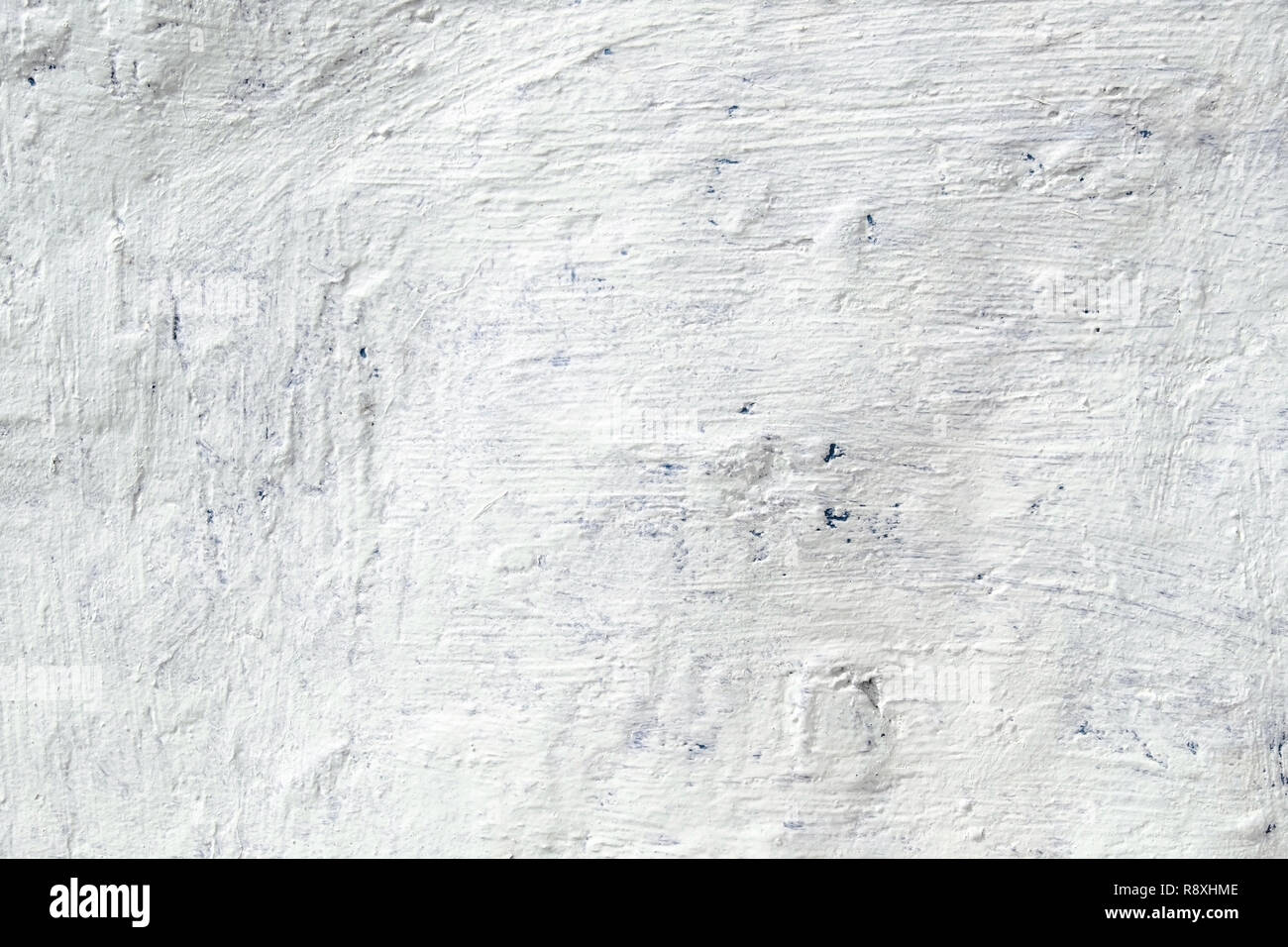 The uneven metal blue wall painted with white paint rough big dabs texture Stock Photo