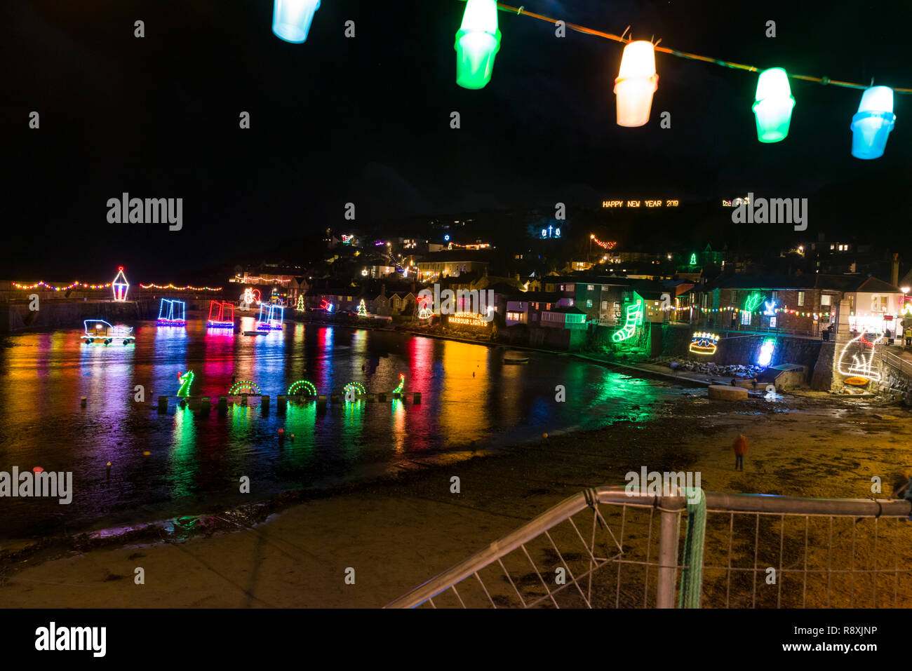 Mousehole, Cornwall, UK. 15/12/2018. Editorial: Members of the public and potential logos. Mousehole Christmas Lights switch on. Stock Photo