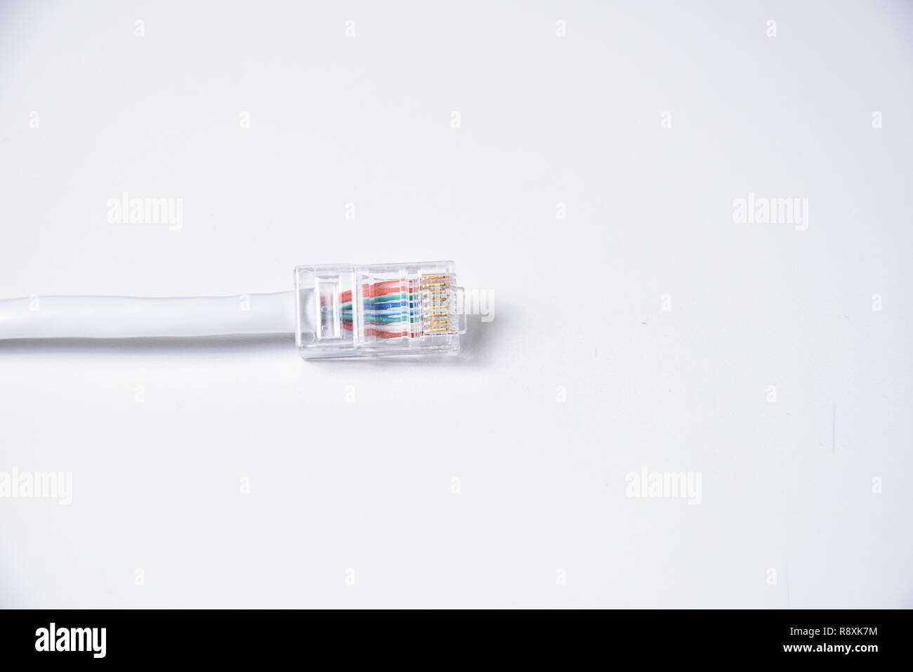 Close up LAN head cable connect copy space on white background, rj45 top  view Stock Photo - Alamy