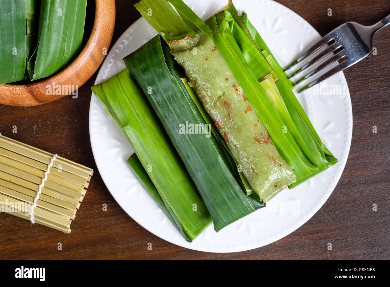 Suman pinipig with buko latik as filipino dessert Stock Photo