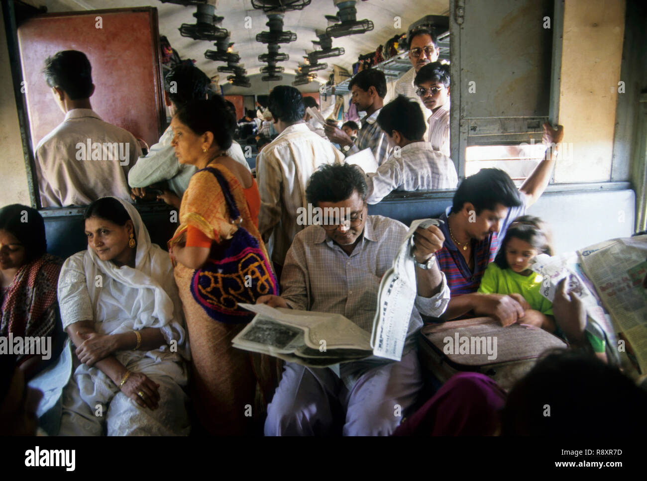 Crowded local suburban train, Bombay, Mumbai, Maharashtra, India Stock Photo