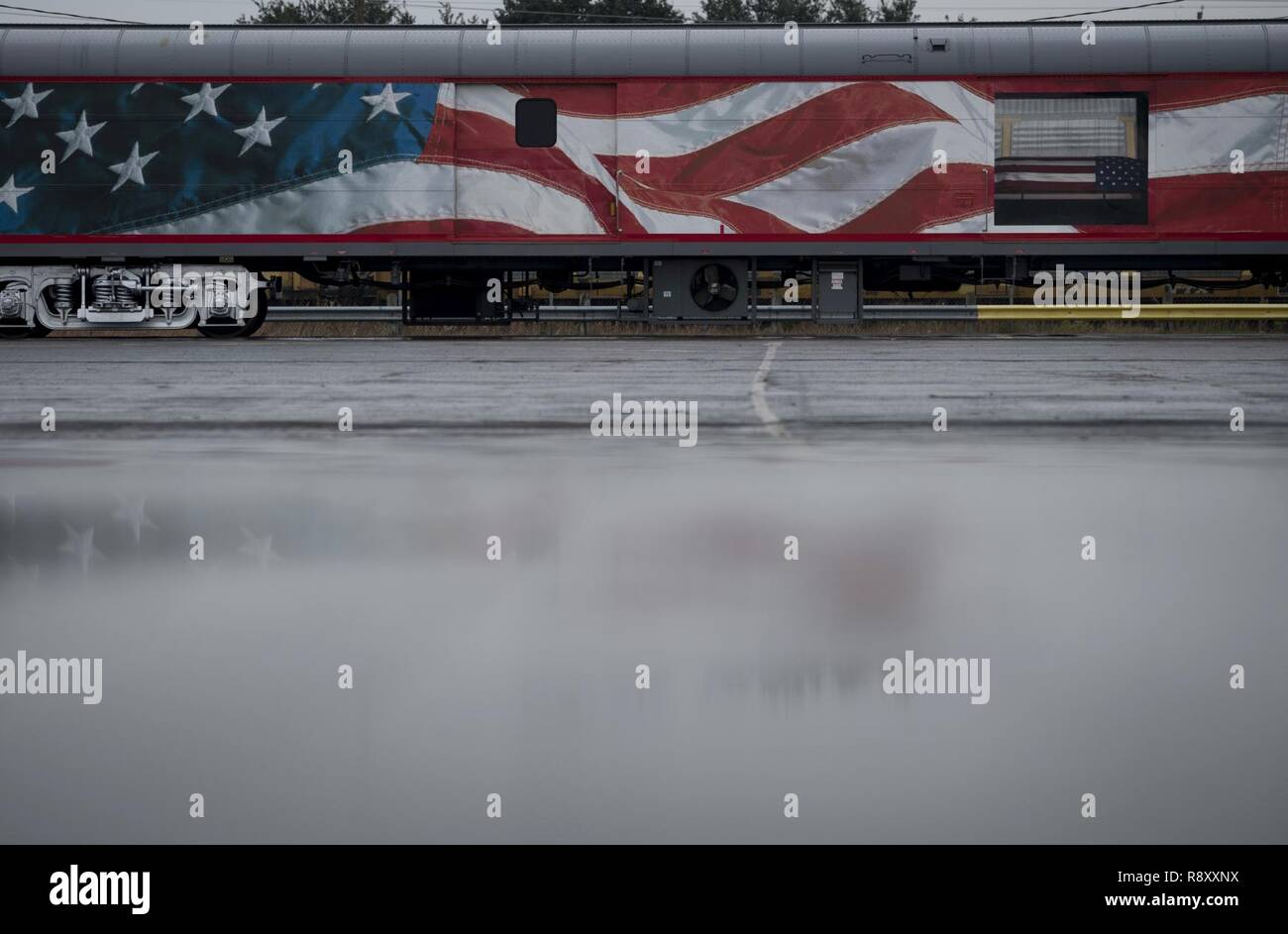 The funeral car, carrying the former President George H.W. Bush, heads to College Station, Texas after a departure ceremony at Union Pacific Westfield Auto Facility, Spring, Texas, Dec. 6, 2018. The funeral car was pulled by the 4141 locomotive. Nearly 4,000 military and civilian personnel from across all branches of the U.S. armed forces, including Reserve and National Guard components, provided ceremonial support during the state funeral of George H.W. Bush, the 41st President of the United States. Stock Photo