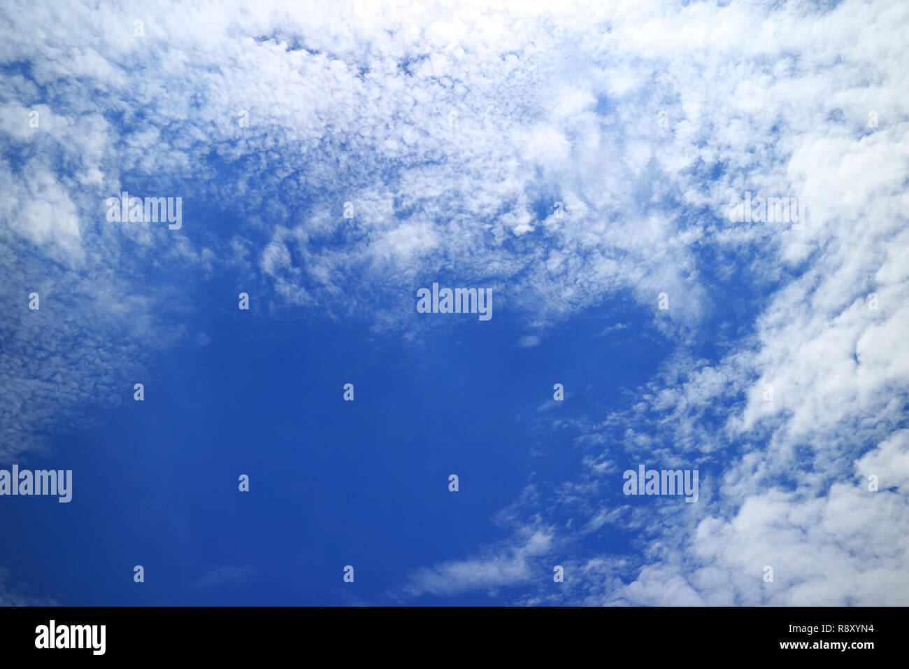 Vivid Blue Sunny Sky with Pure White Clouds Stock Photo - Alamy