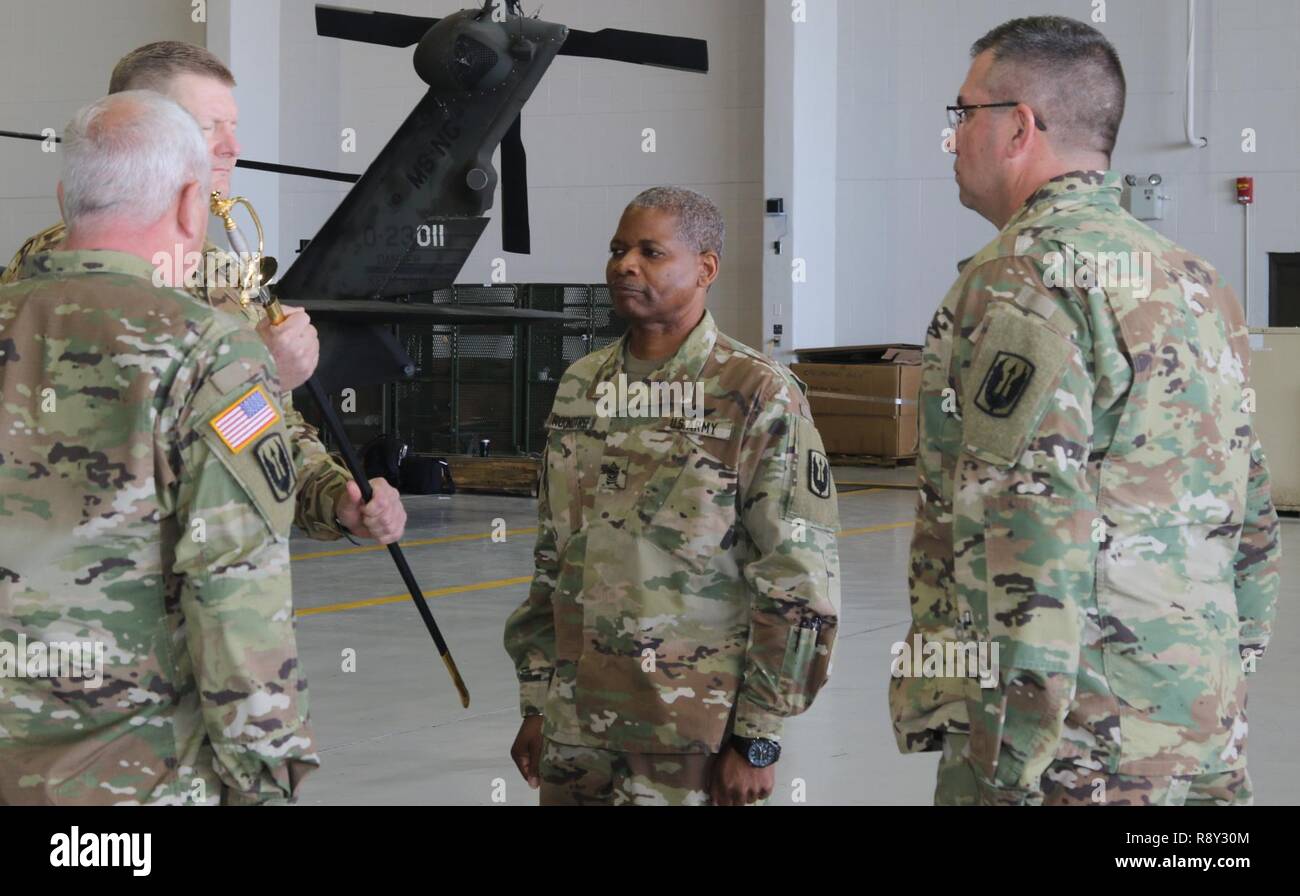 Command Sgt. Major Fredrick Roundtree prepares to accept a ceremonial