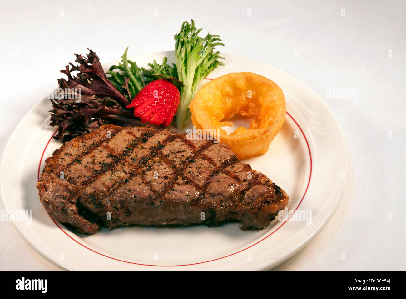 New York Strip Steak dinner with vegetables, by James D Coppinger