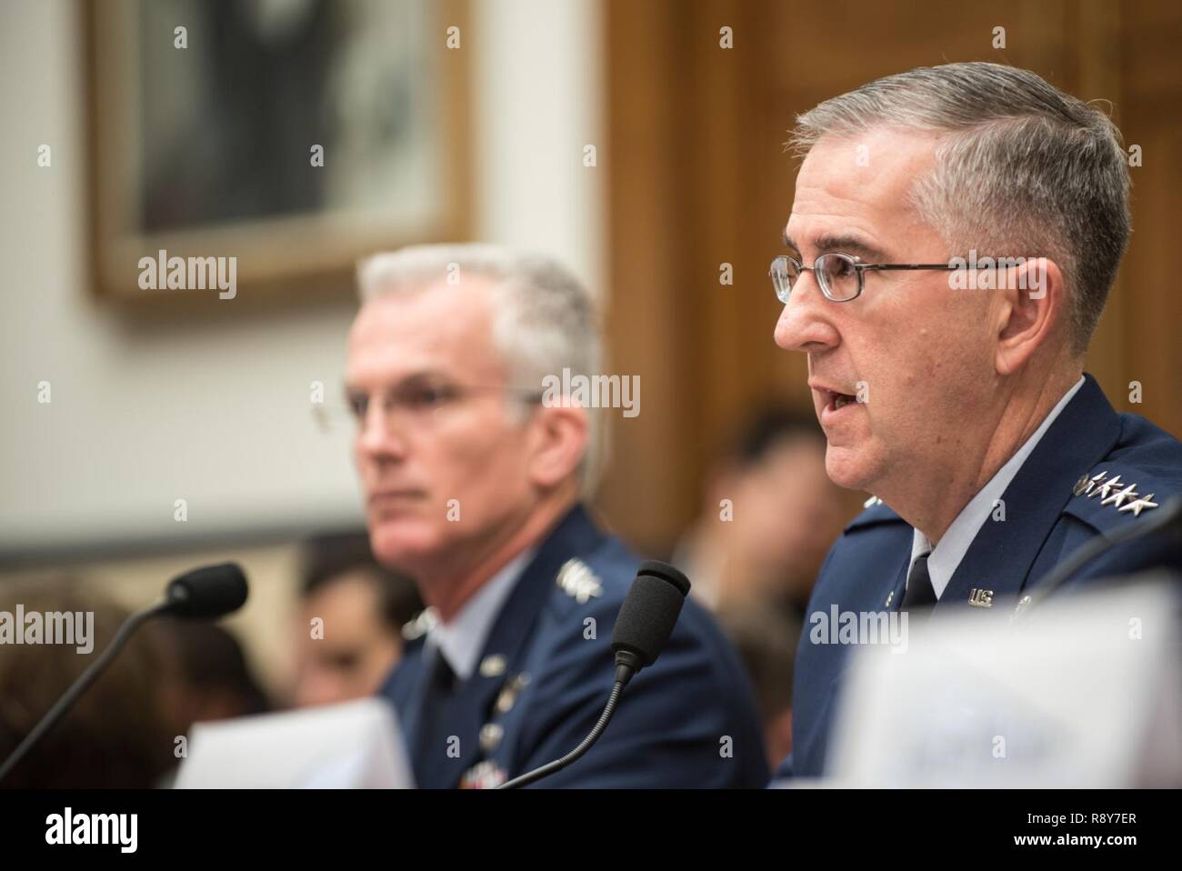 U.S. Air Force Gen. John E. Hyten, commander of U.S. Strategic Command, testifies during a House Armed Services Committee hearing on Capitol Hill, March 7, 2017. Gen. Hyten testified alongside U.S. Air Force Gen. Paul J. Selva, Vice Chairman of the Joint Chiefs of Staff; U.S. Navy Adm. Bill Moran, Vice Chief of Naval Operations; and U.S. Air Force Vice Chief of Staff Gen. Stephen Wilson. They spoke about the continuing relevance of U.S. nuclear forces for our national security and the steps the Joint Force is taking to modernize and replace them. He also stated that U.S. weapons, delivery syst Stock Photo
