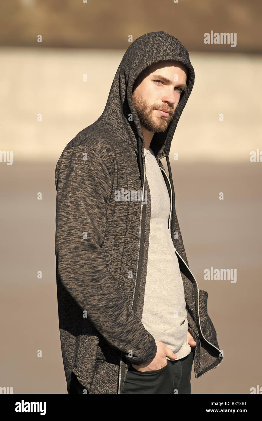 Macho with beard in hoodie on sunny outdoor, fashion. Man wear sweatshirt,  casual style. Mens fashion, style, sportswear. Lifestyle for active and  healthy man, sport Stock Photo - Alamy