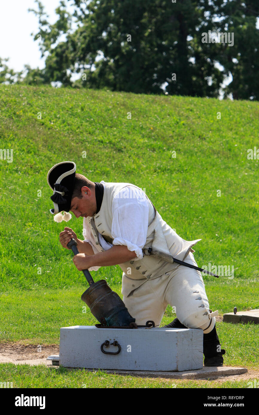 Historical reenactor firing a mortar at Fort Niagara State Park in Lewiston, New York. Stock Photo