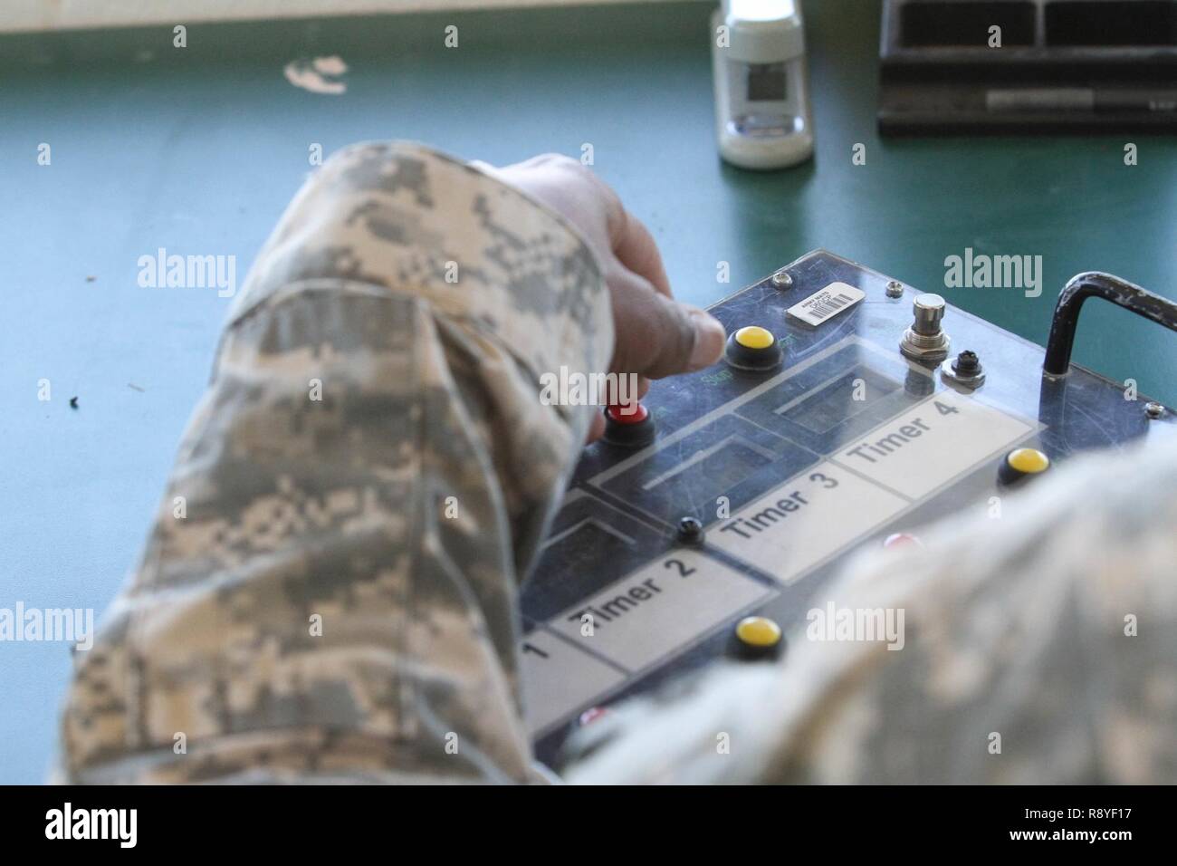 A U S Army Reserve Soldier Runs The Timer For Gunnery Table Four During Operation Cold Steel