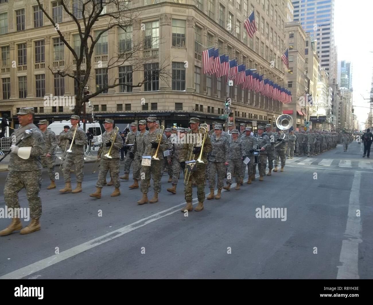 U.S. Soldiers with the 42nd Infantry Division Band, New York Army National Guard march up 5th Avenue leading the New York City St. Patrick's Day Parade with the 1st Battalion, 29th Infantry March 17, 2017. The unit, famous for its Irish heritage and service in the Civil War, WWI, WWII and Iraq has led the city parade for 166 years. Stock Photo