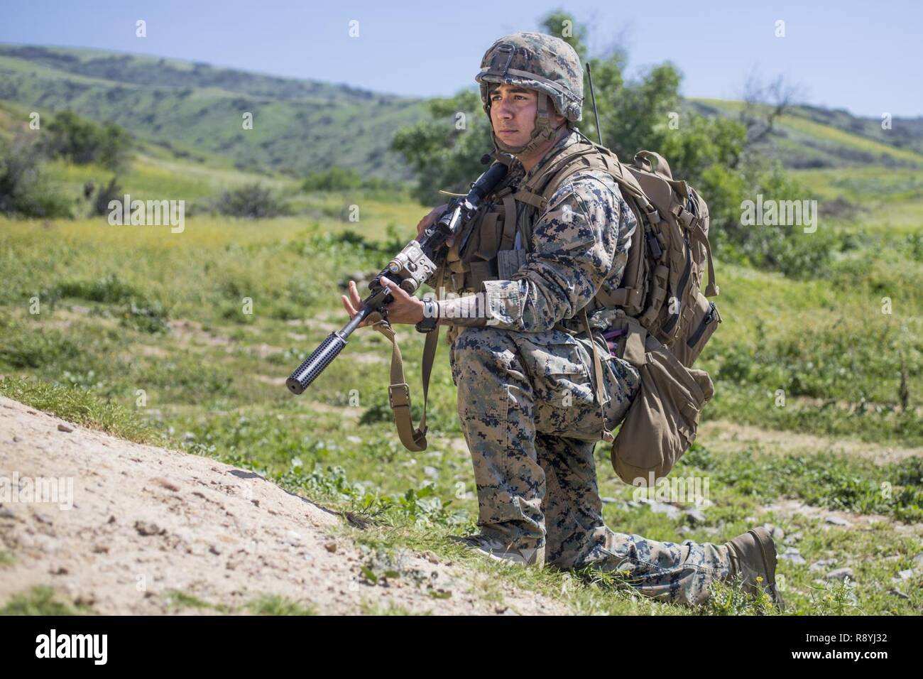 U.S. Marine Corps Cpl. Edgardo Gonzalez, rifleman, 3rd Battalion, 5th Marine Regiment provides security during a raid rehearsal at Camp Pendleton, Calif., March 16, 2017. Marines with 3rd Battalion, 5th Marine Regiment are training to maintain unit proficiency and preparing to deploy with the 15th Marine Expeditionary Force. Stock Photo