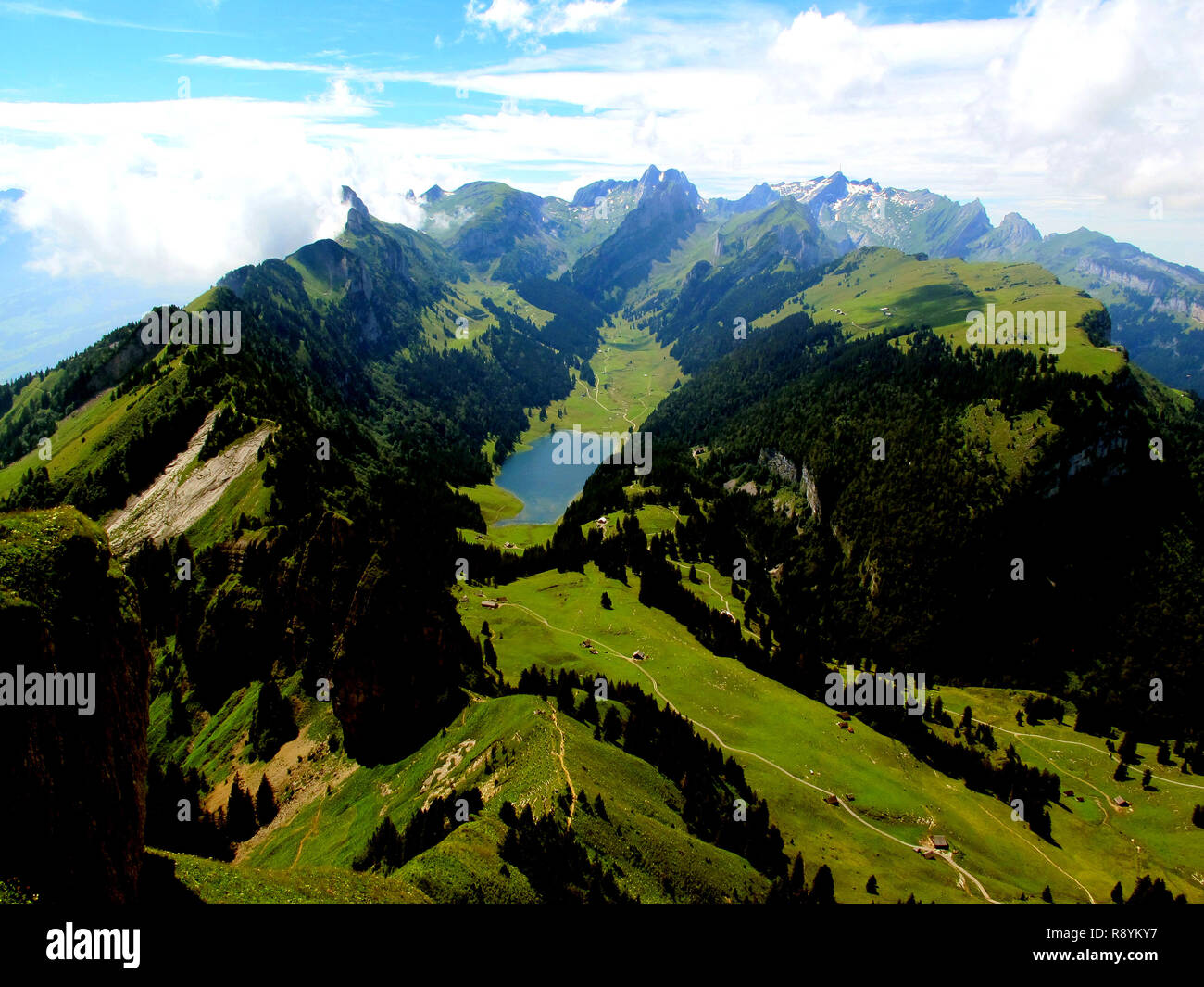 Panorama view from the top of a mountain. Alpstein mountains in Switzerland. Stock Photo
