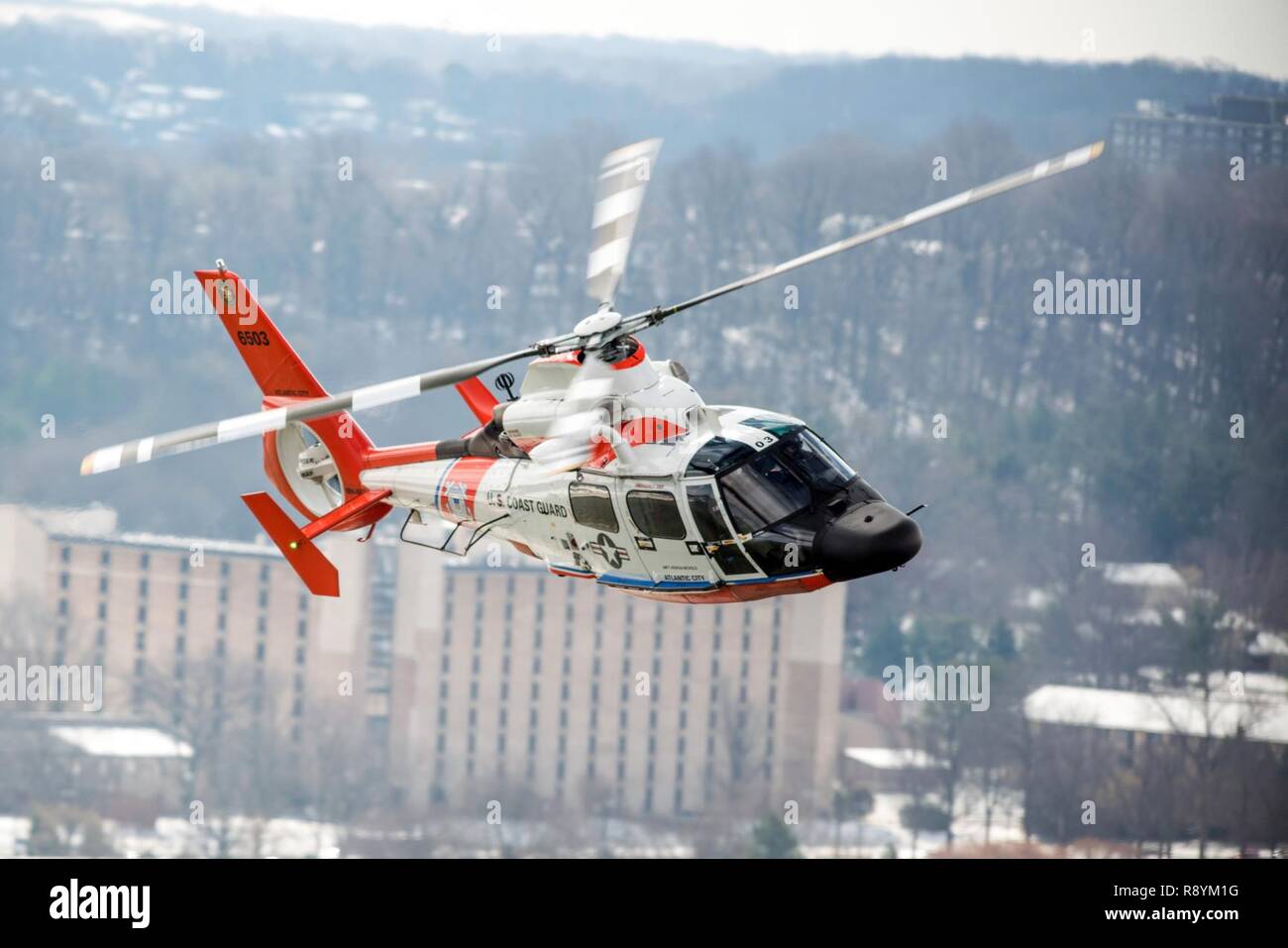 A Coast Guard MH65 Dolphin helicopter crew from Air Station Atlantic