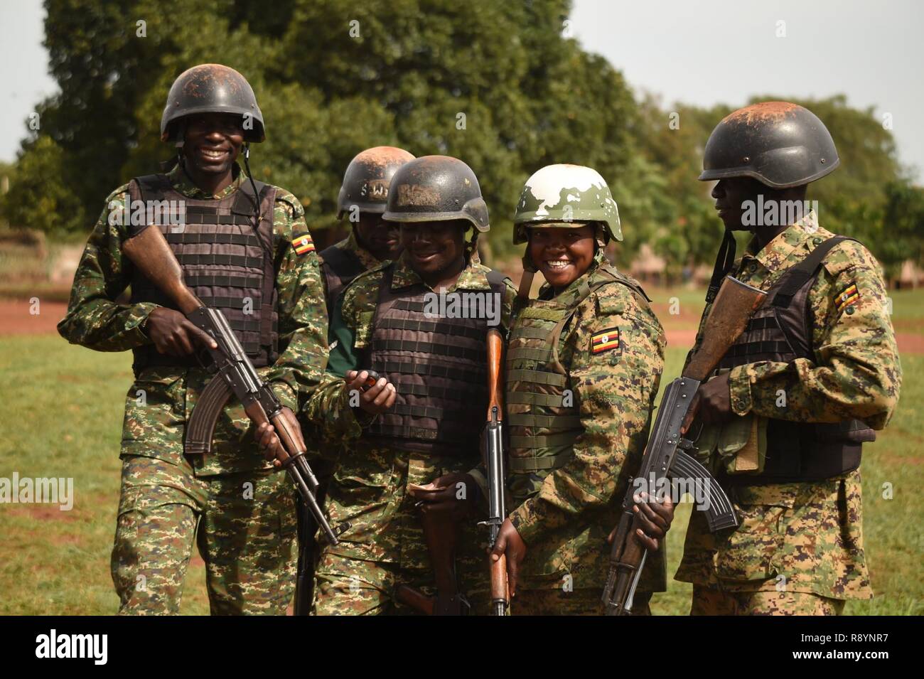 Uganda People’s Defense Force, Ugandan Battle Group 22 soldiers smile while setting points in