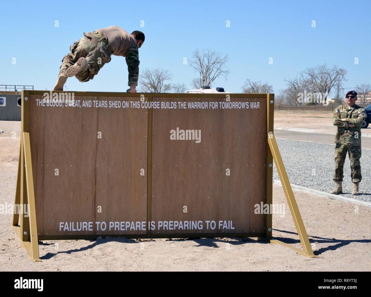 Pararescue trainees from the 351st Battlefield Airmen Training Squadron test the unit's new assault course March 17 at Kirtland. The course includes challenges like low crawls, rope and rock climbing, and jumping over a high wall, and will be used in training BATS students. Stock Photo