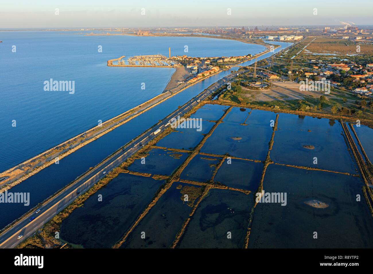 France Bouches Du Rhone Gulf Of Fos Sur Mer Fos Sur Mer Salt Flats Canal Navigation And Tip Of Saint Gervais Industrial Zone In The Background Aerial View Stock Photo Alamy