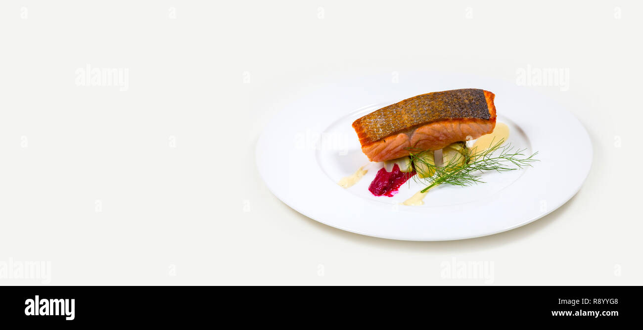 Salmon Steak on a white plate on a white background isolated Stock ...