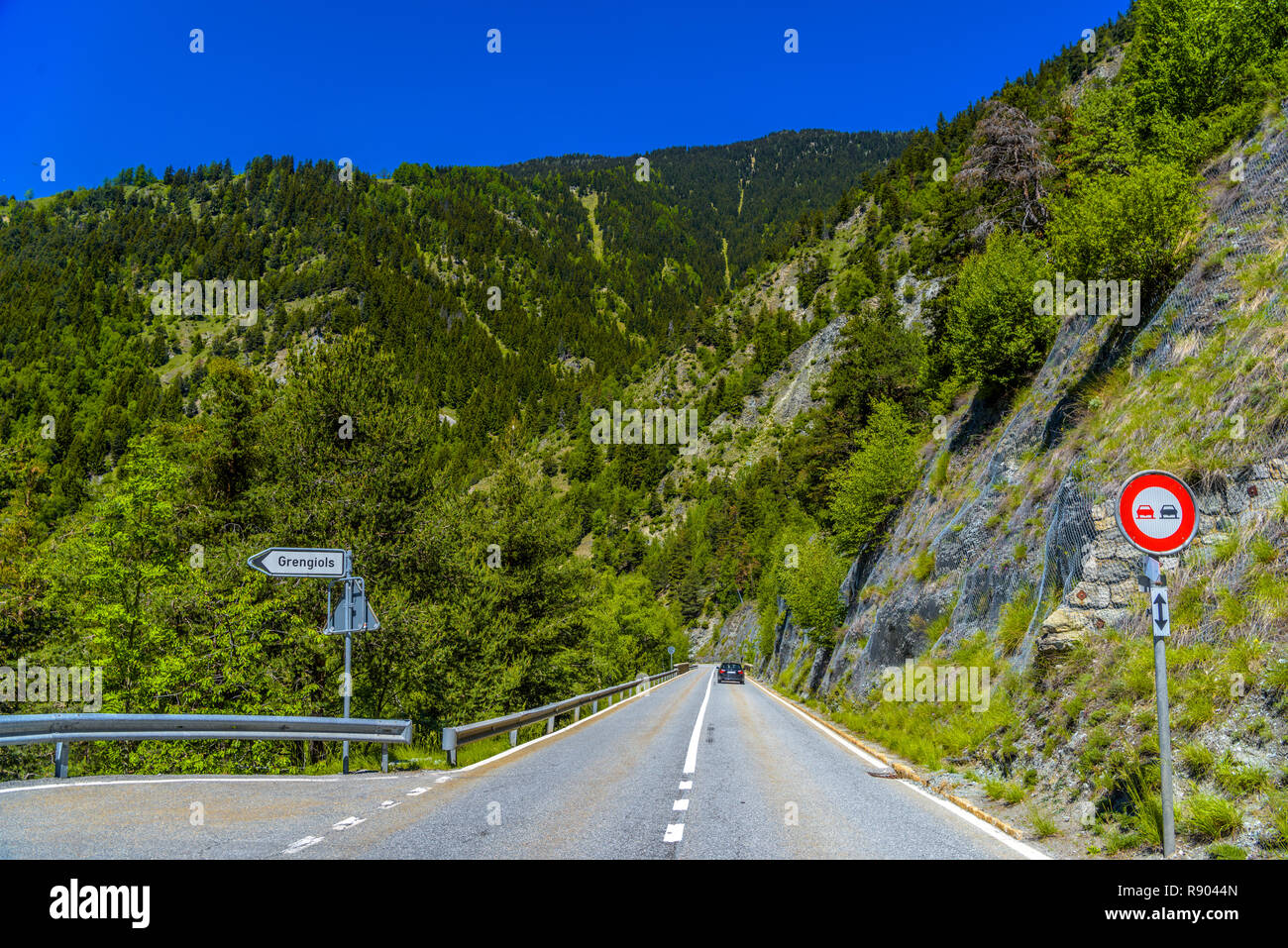 Asphalt road in Alps mountains in Moerel, Filet, Oestlich Raron, Wallis Valais Switzerland Stock Photo