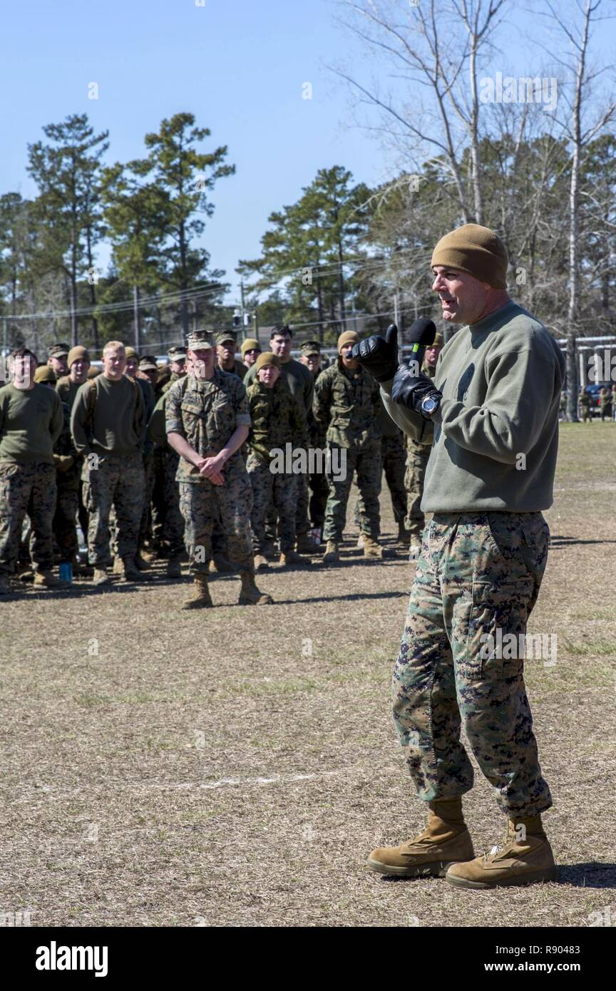 U.S. Marine Corps Col. Daniel P. O’Hora, commanding officer, Marine Corps Engineer School, gives his remarks during the Marine Corps Engineer School Annual St. Patrick’s Day Field Meet, Ellis Field, Courthouse Bay, Camp Lejeune, N.C., March 16, 2017. The field meet was held to strengthen camaraderie while celebrating the Patron Saint. Stock Photo