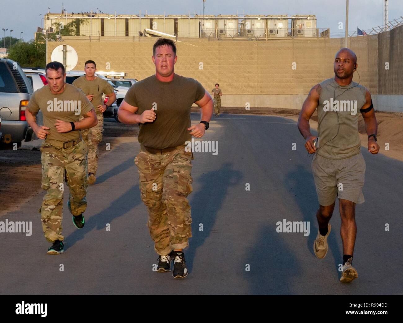 From left, U.S. Army Sgt. 1st Class William Dixon, 1st Lt. James Drewry ...