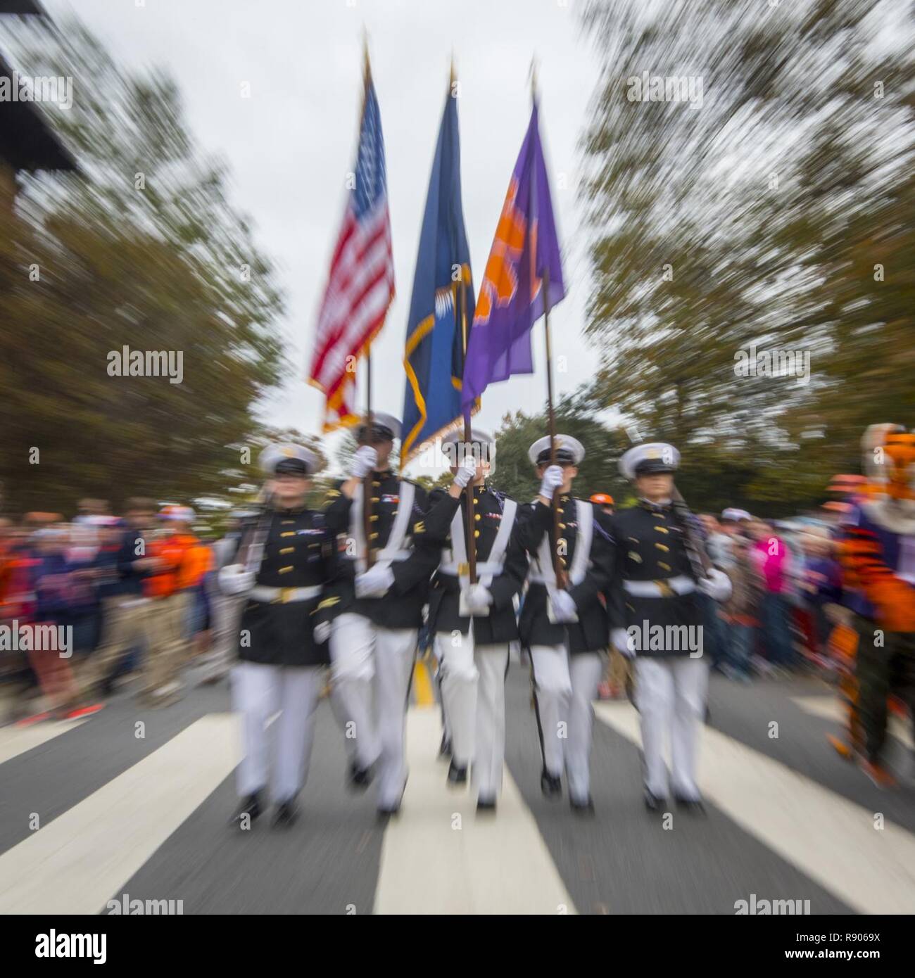 The Clemson University Pershing Rifles honor guard lead the parade into Memorial Stadium before the Tigers take on The Citadel Bulldogs in the 2017 Military Appreciation Game, Nov. 18, 2017. Stock Photo