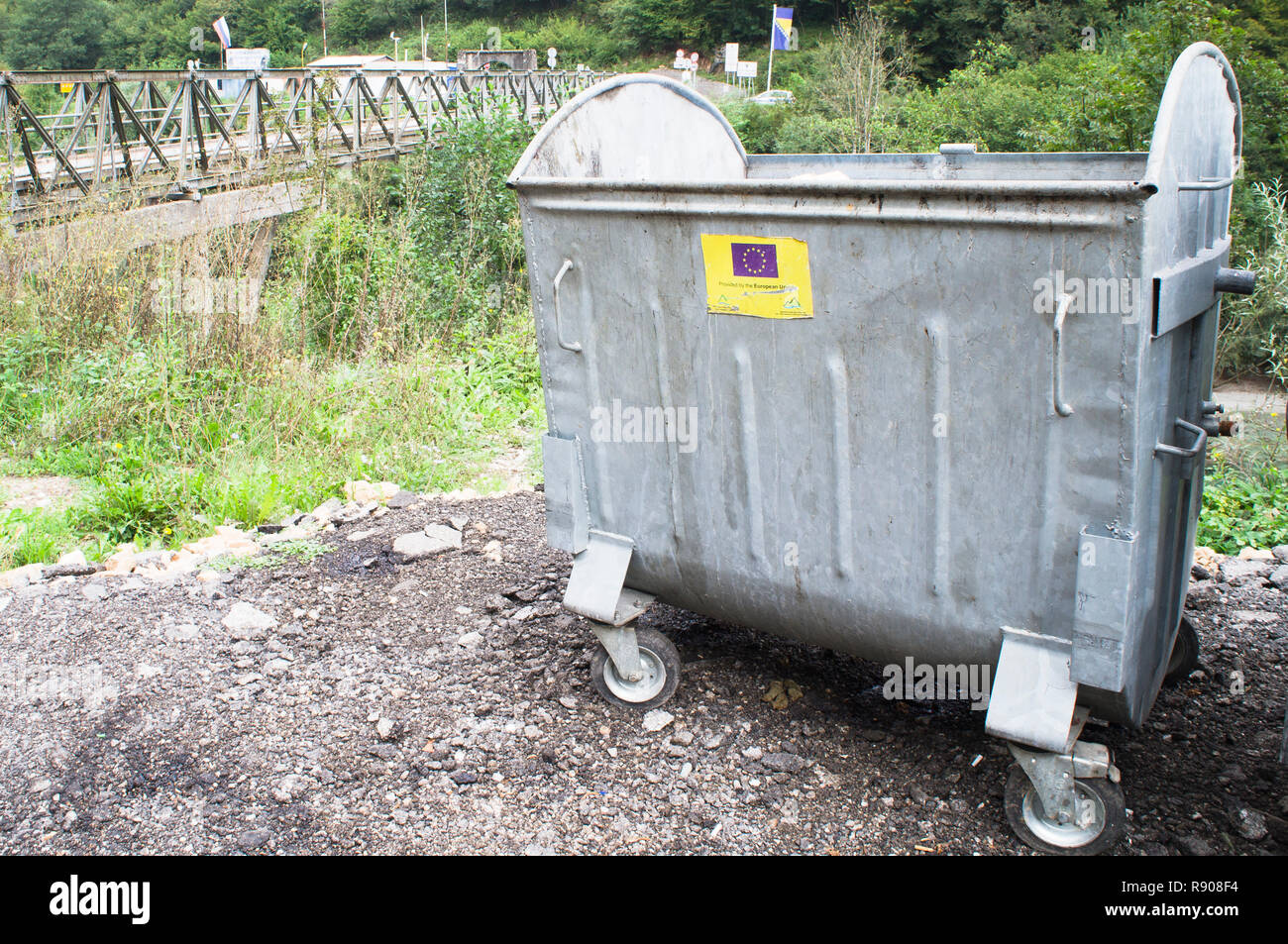 Scepan Polje/Hum border crossing Montenegro - Bosnia and Herzegovina, MNE-BIH, unsorted residual waste, container, Provided by European Union sticker, Stock Photo