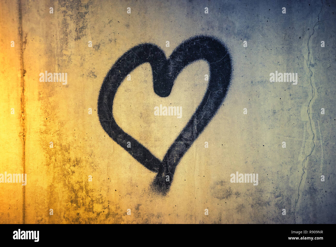 Drawn heart on a stone background Stock Photo