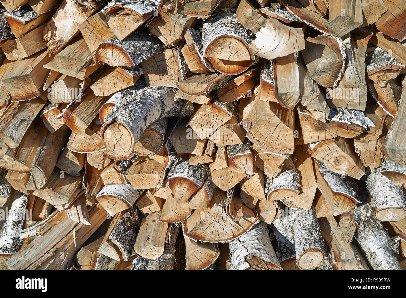 Background of dry chopped firewood logs in a pile Stock Photo - Alamy