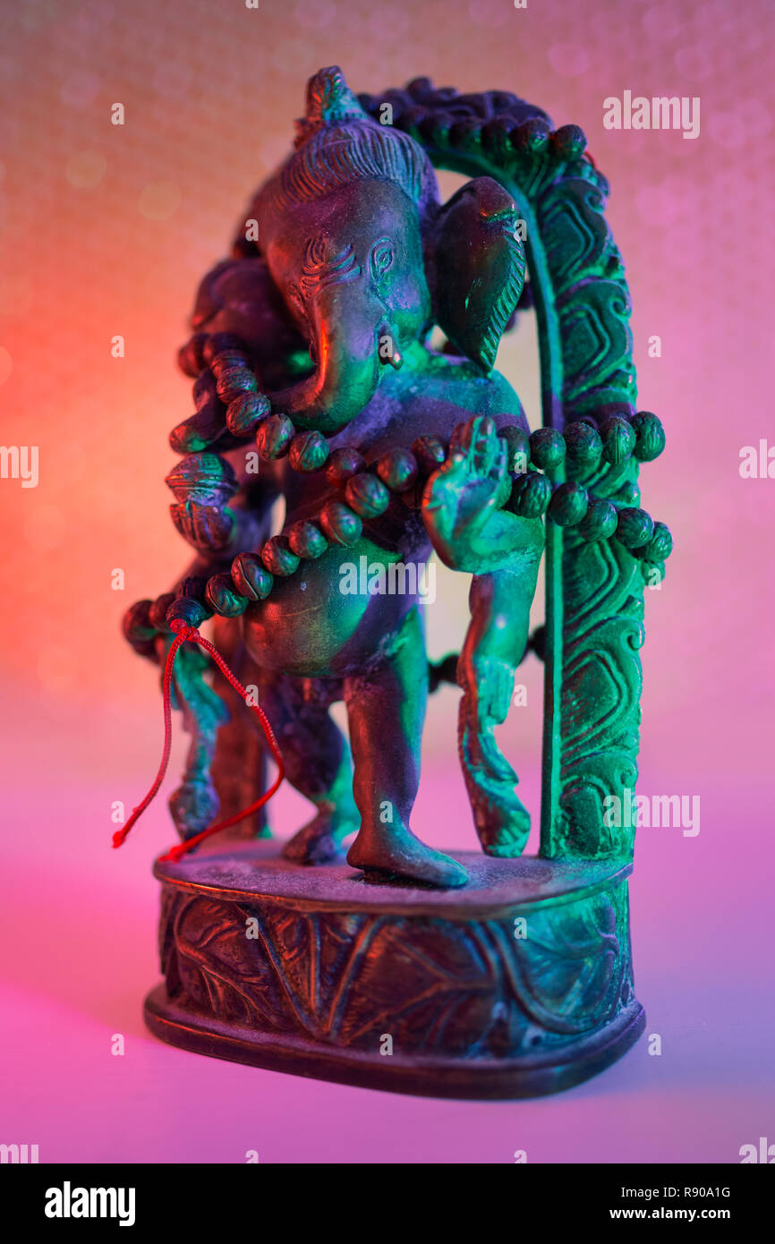 Ganesh Rudra Roop Hindu God - Lord Ganesha with rudraksha rosary in a colorful light ...