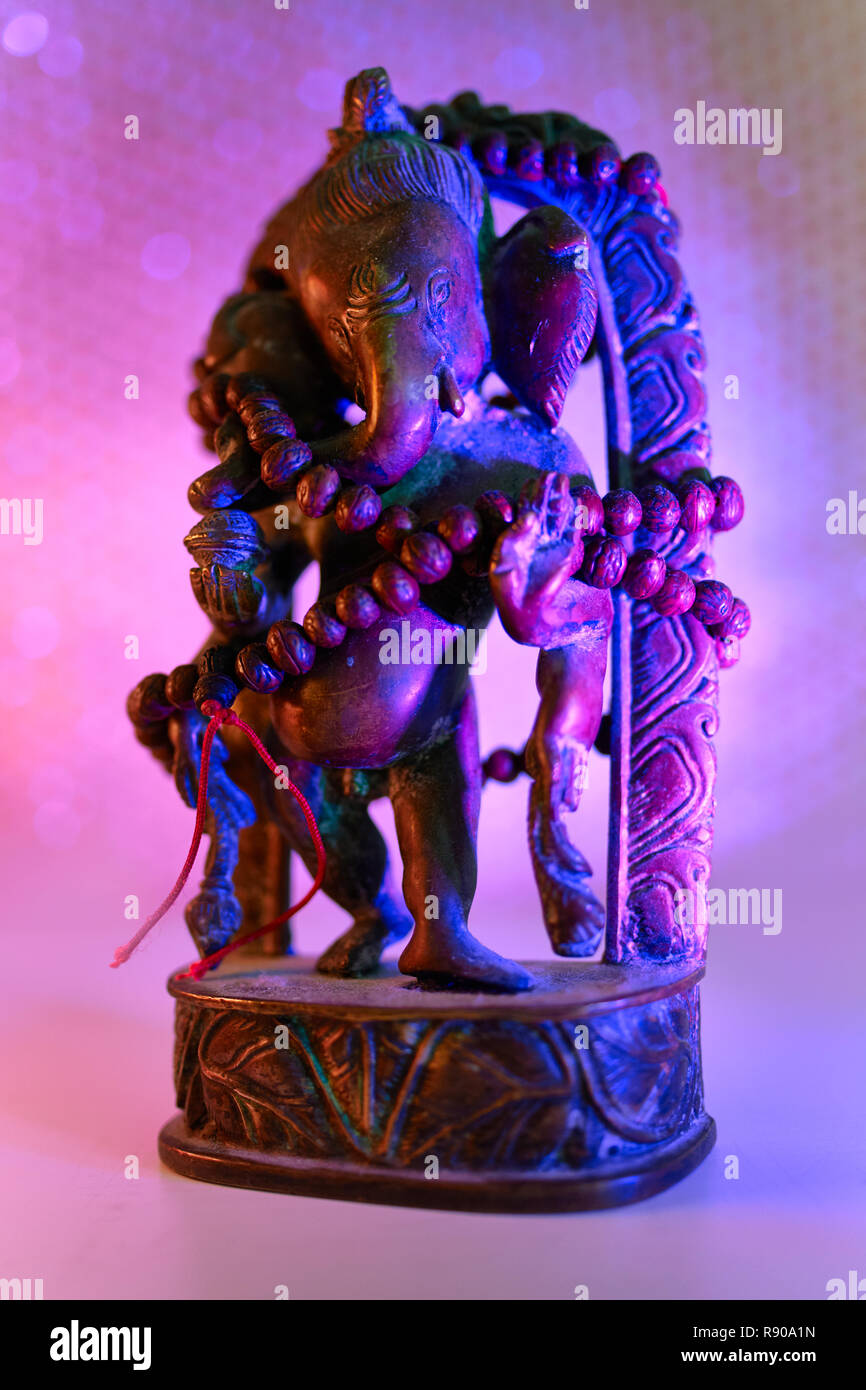 Ganesh Rudra Roop Hindu God - Lord Ganesha with rudraksha rosary in a colorful light ...