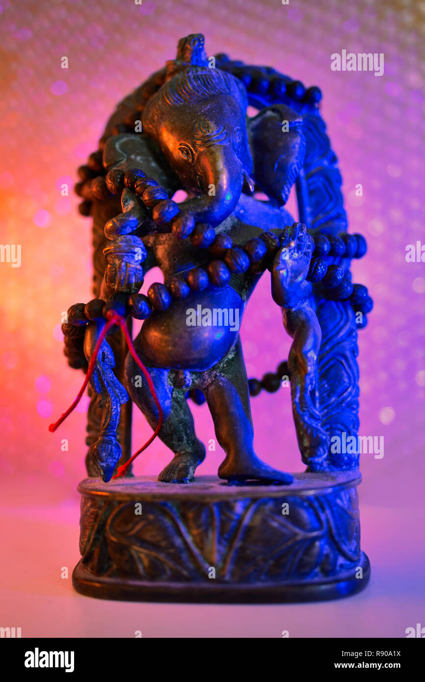Ganesh Rudra Roop Hindu God - Lord Ganesha with rudraksha rosary in a colorful light ...