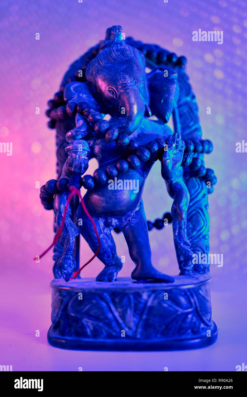 Ganesh Rudra Roop Hindu God - Lord Ganesha with rudraksha rosary in a colorful light ...