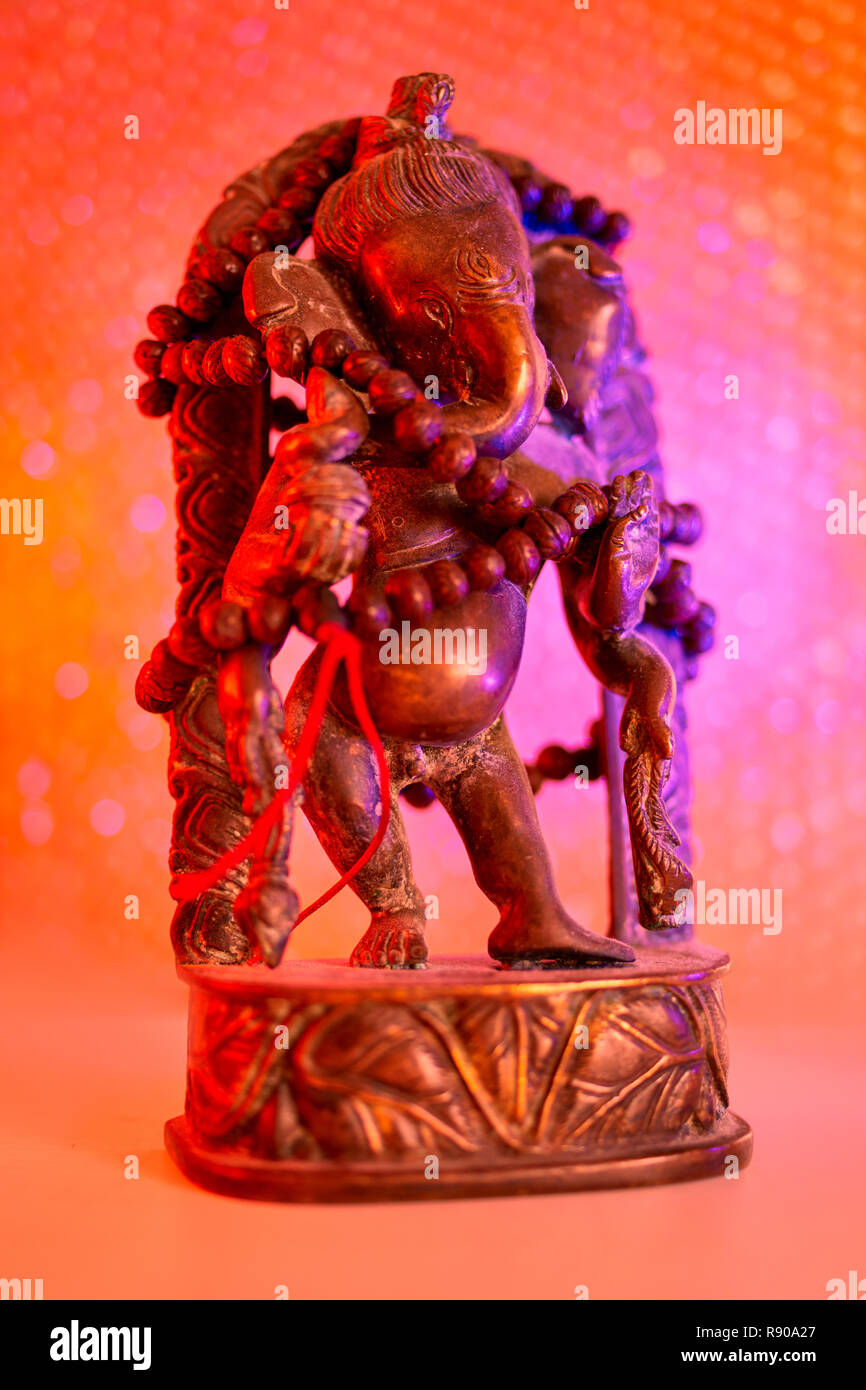 Ganesh Rudra Roop Hindu God - Lord Ganesha with rudraksha rosary in a colorful light ...