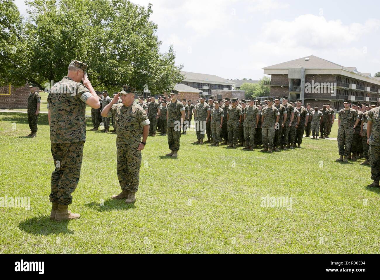 U.S. Marines and Sailors with 2nd Medical Battalion, II Marine Expeditionary Force (II MEF), stand in formation before receiving the “Lt. Gen. Chesty Puller” Outstanding Leadership Award on Camp Lejeune, N.C., May 10, 2017. The battalion earned this award for exceptional professional ability, superior performance and dedication to supporting the mission of the II MEF. Stock Photo