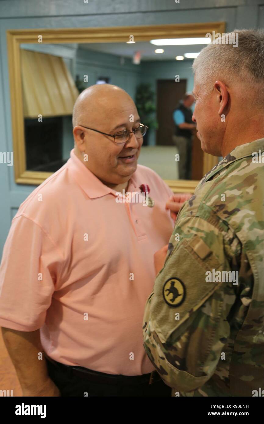Mg Deblieck Pins The Superior Civilian Service Award On Oscar Sanchez Who Is Retiring After Nearly 50 Years Of Continuous Service To The U S Army Stock Photo Alamy