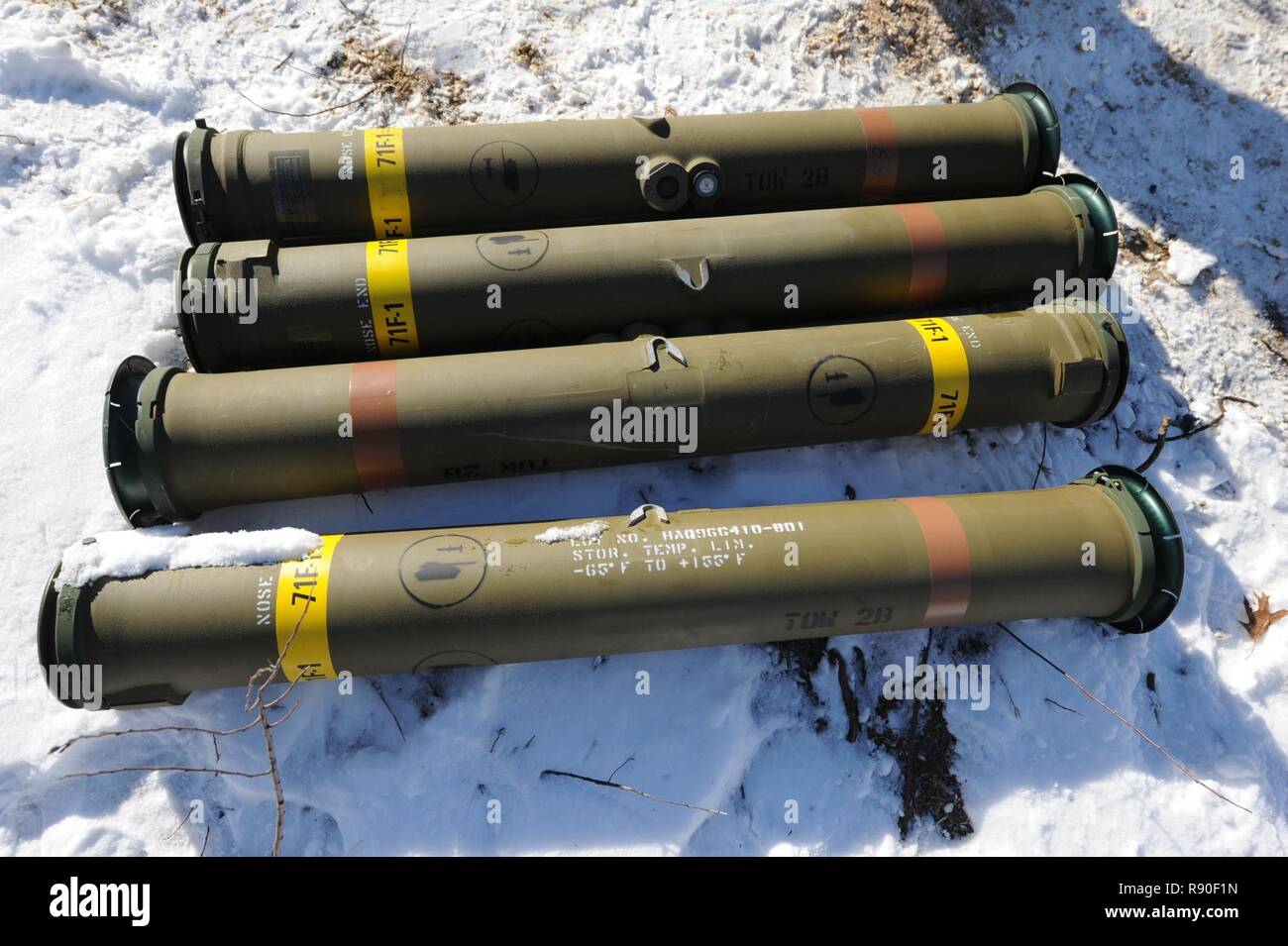 Several spent anti-tank TOW missile casings are seen  at Fort McCoy, Wis., on March 14, 2016. The  BGM-71 TOW is a Tube-launched, Optically tracked, Wire-guided  anti-tank missile currently manufactured by Raytheon. Stock Photo
