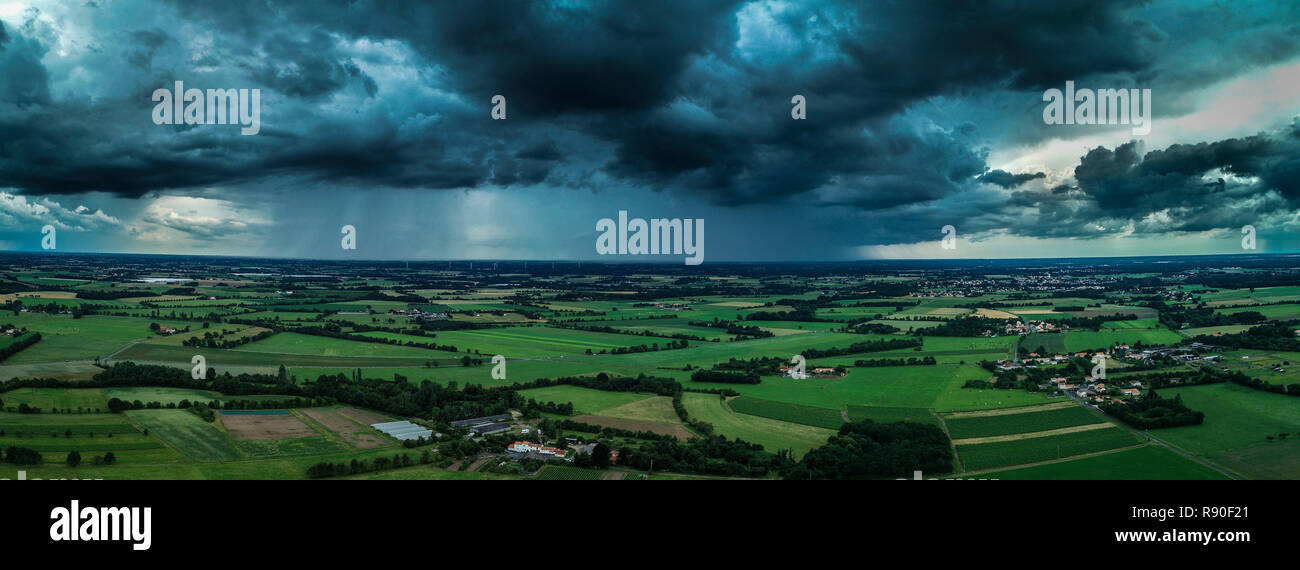Storm above the wooded countryside of Vendee with heavy rainfall and wind, aerial view from a drone, on 2018/06/08 *** Local Caption *** Stock Photo