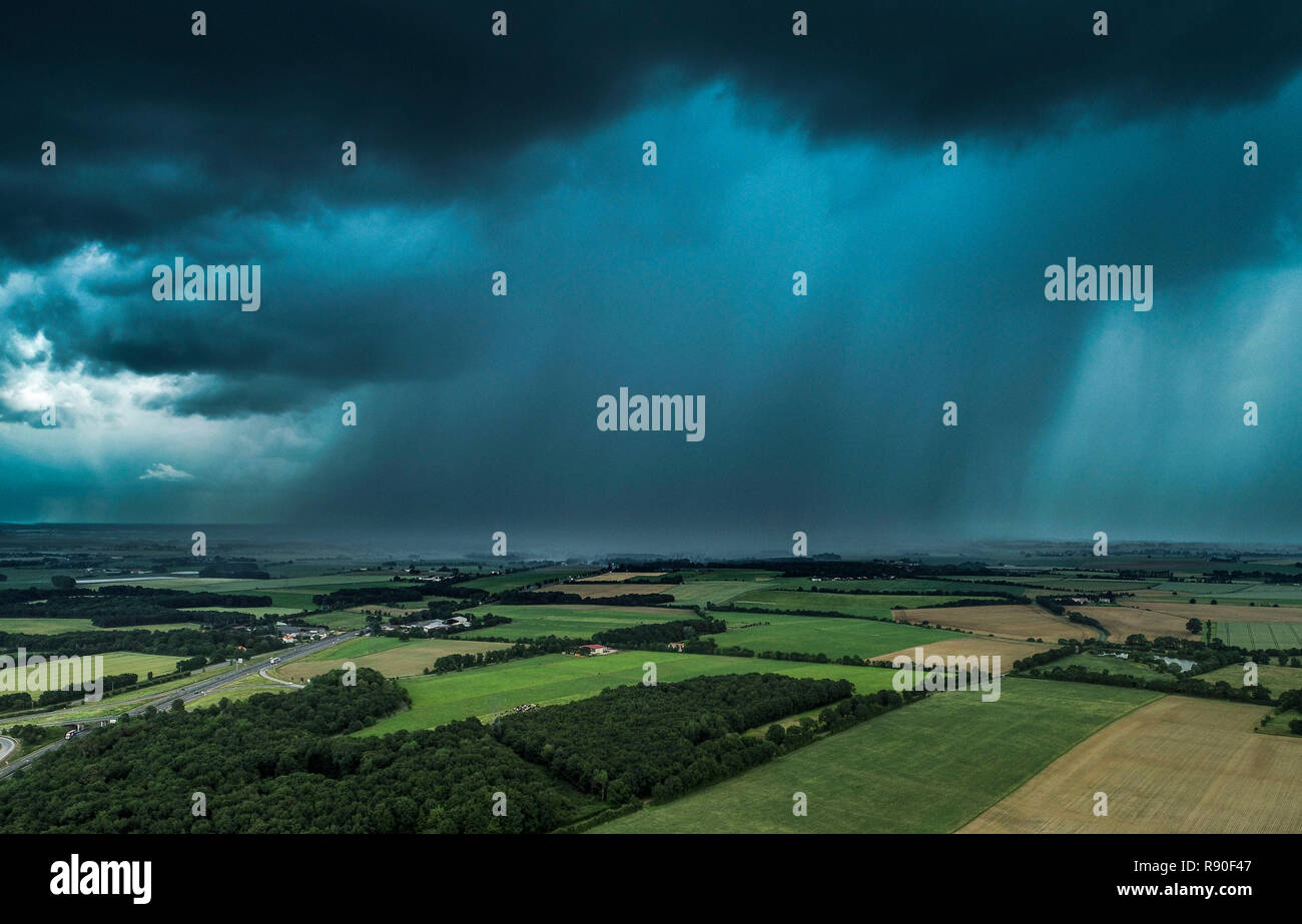 Storm above the wooded countryside of Vendee with heavy rainfall and wind, aerial view from a drone, on 2018/06/08 *** Local Caption *** Stock Photo