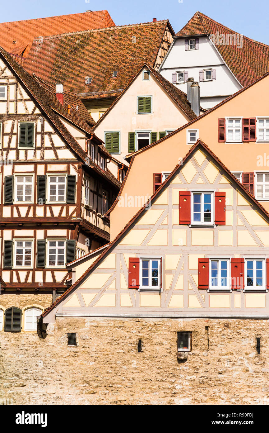 historic half-timbered houses  in schwaebisch hall seen from the shore of river kocher Stock Photo