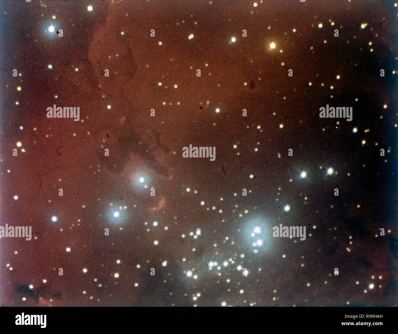 Nebulosity and star cluster in Serpens. Creator: NASA. Stock Photo