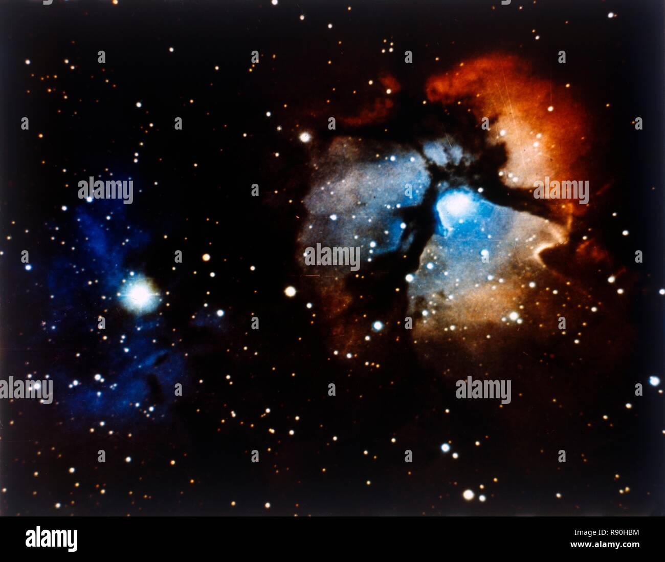 Trifid Nebula in Sagittarius constellation. Creator: NASA. Stock Photo