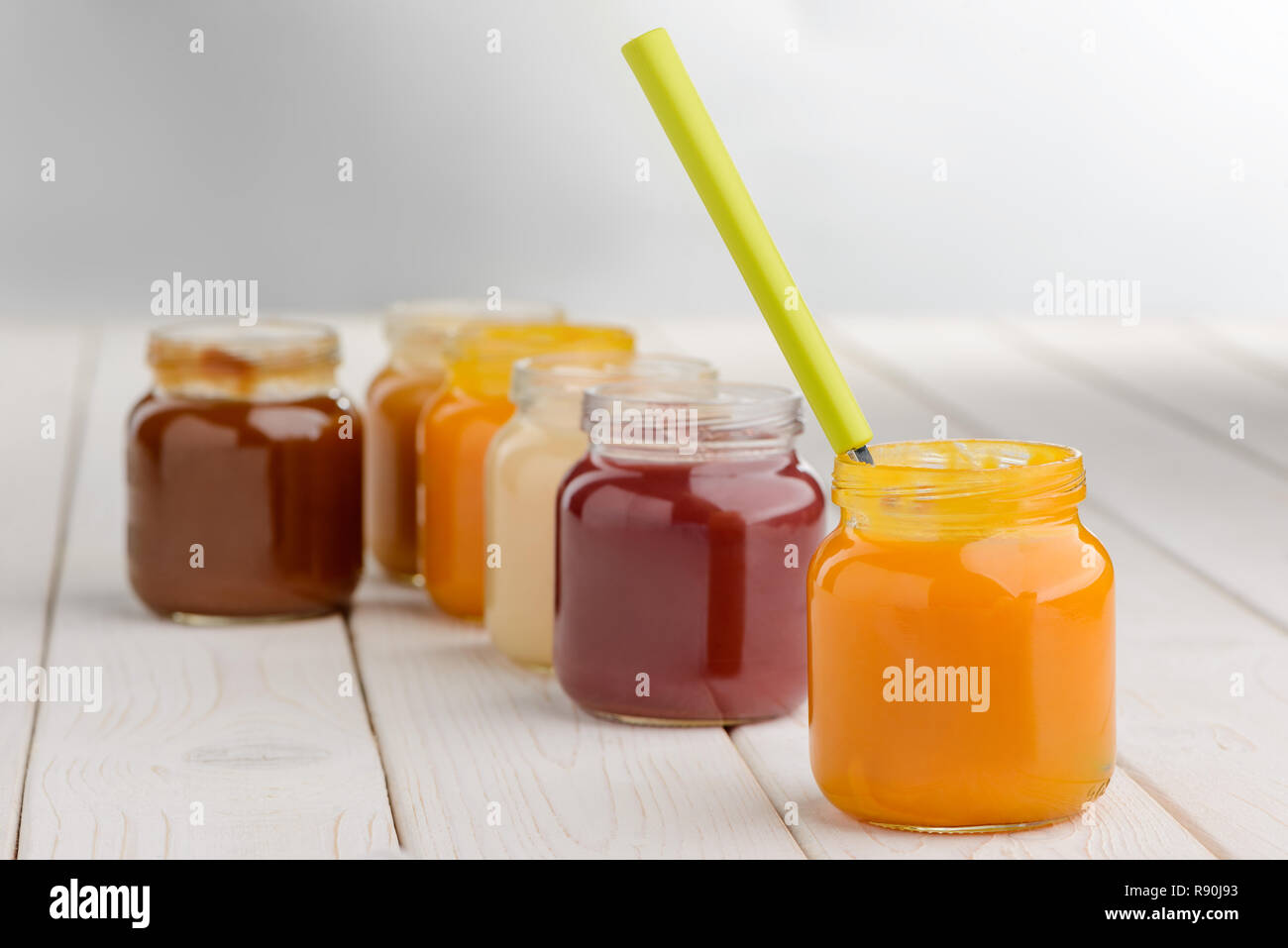 Opened jars of baby food Stock Photo Alamy