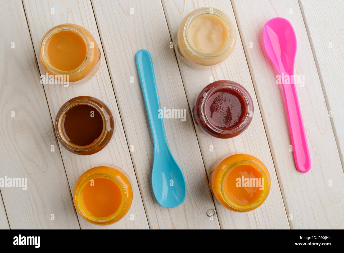 Baby food jars and spoons Stock Photo Alamy