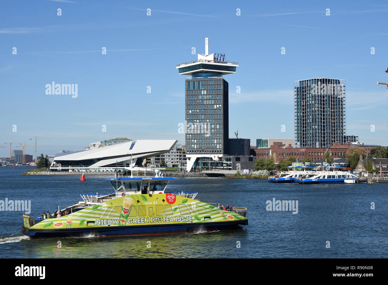 Waterfront of Amsterdam Noord district with modern building of EYE Film Institute and Amsterdam Tower The Netherlands, (North bank of the IJ) Stock Photo