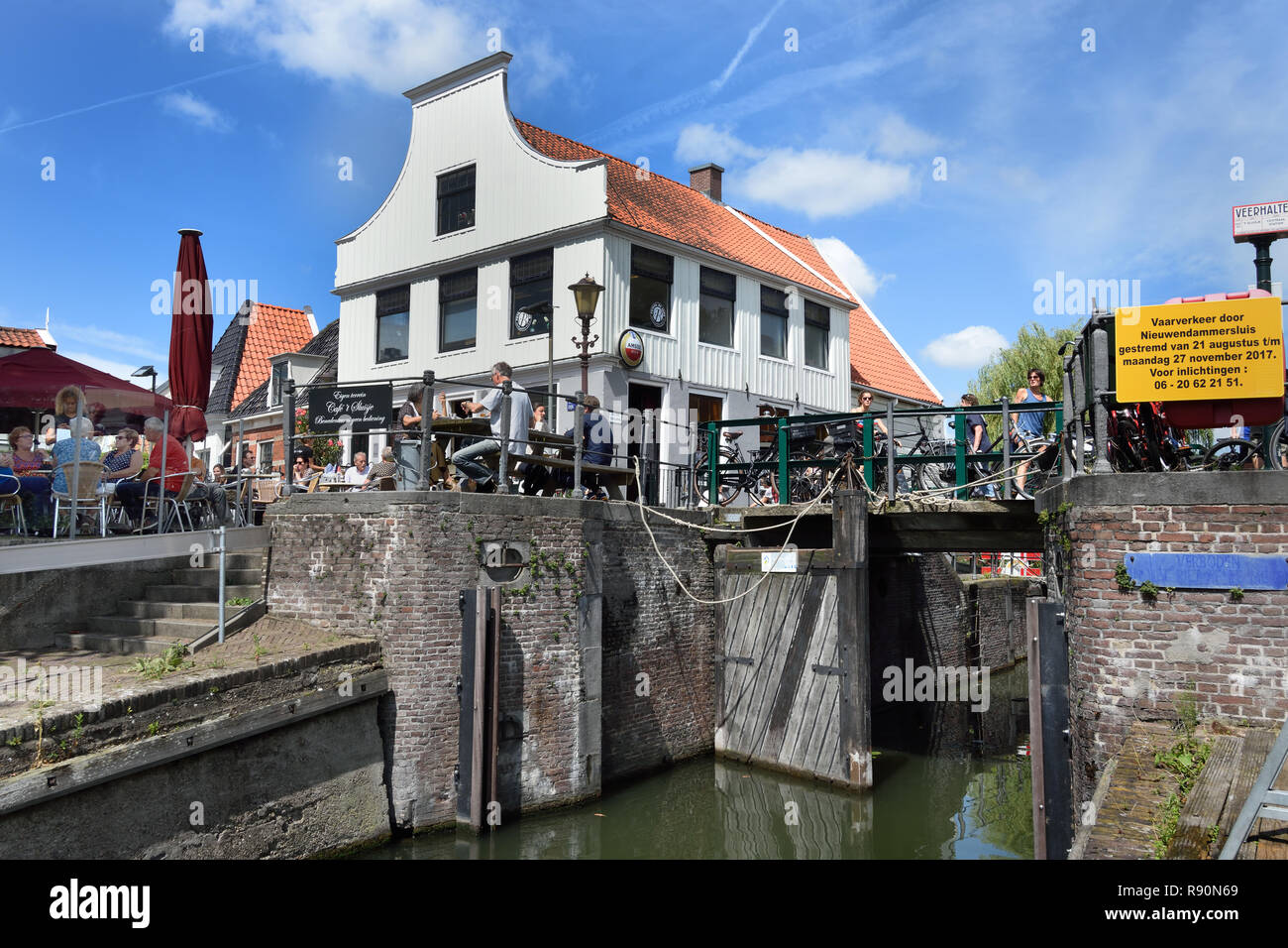 Café t Sluis old, brown café 100 years building 1565, terrace on the water, (a side channel of t IJ), Amsterdam Noord - North, The Netherlands, Dutch, Stock Photo