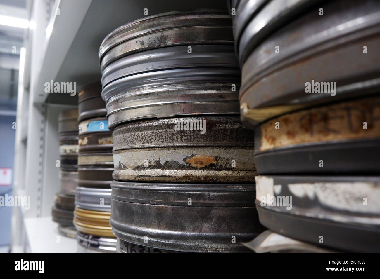 Movie Trailers in Metal Film Cans Stock Image - Image of curly