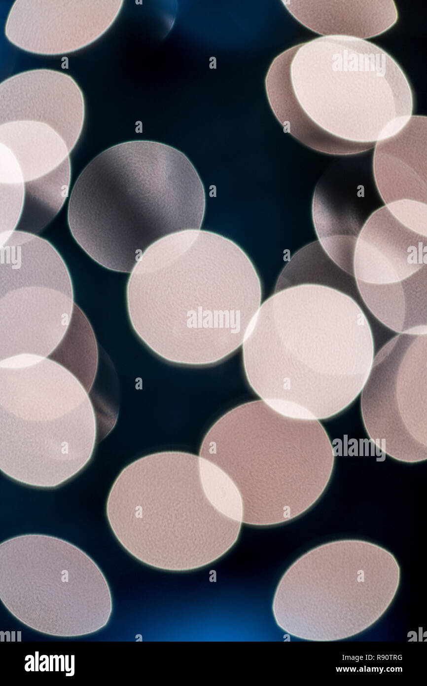 Bokeh created by blurred Christmas tree lights Stock Photo