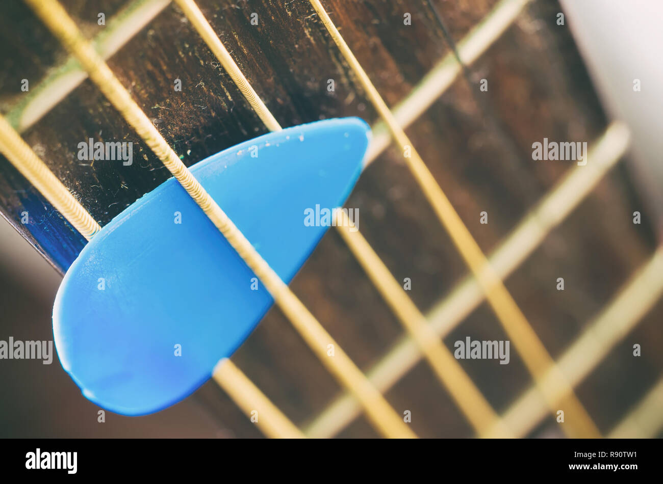 guitar neck with metal strings macro Stock Photo