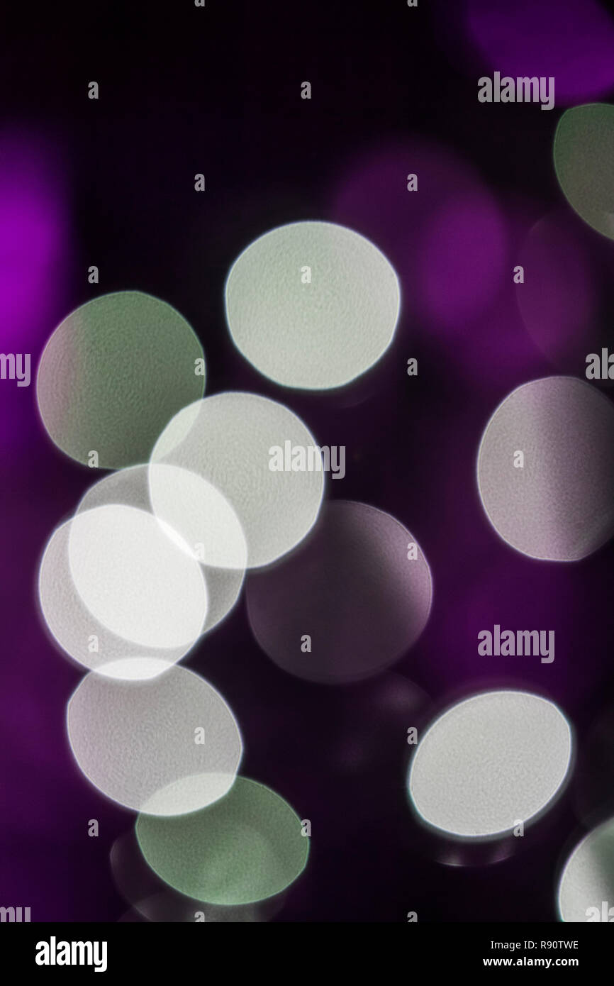 Bokeh created by blurred Christmas tree lights Stock Photo